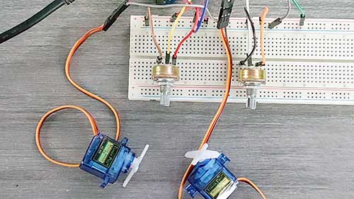 Realtime Servo Motor Control with Switches and Potentiometers